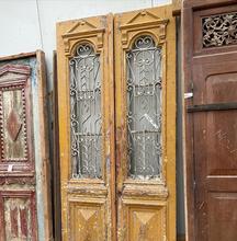Antique style Antique doors in wood and iron