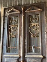 Antique style Antique doors in wood and iron