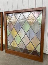 Antique style stained glass window in Wood