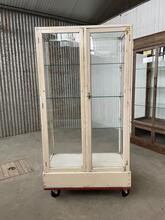 Shopcabinet style Antique showcase in wood and glass 20e eeuw