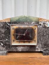 Antique style Art deco clock in marble stone  in marble