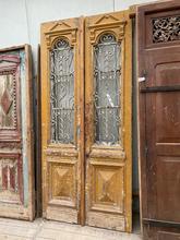 Antique style Antique doors in wood and iron