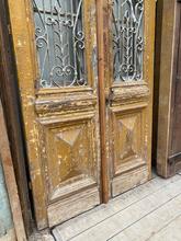 Antique style Antique doors in wood and iron