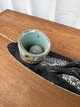 Antique style Man in canoe lamp